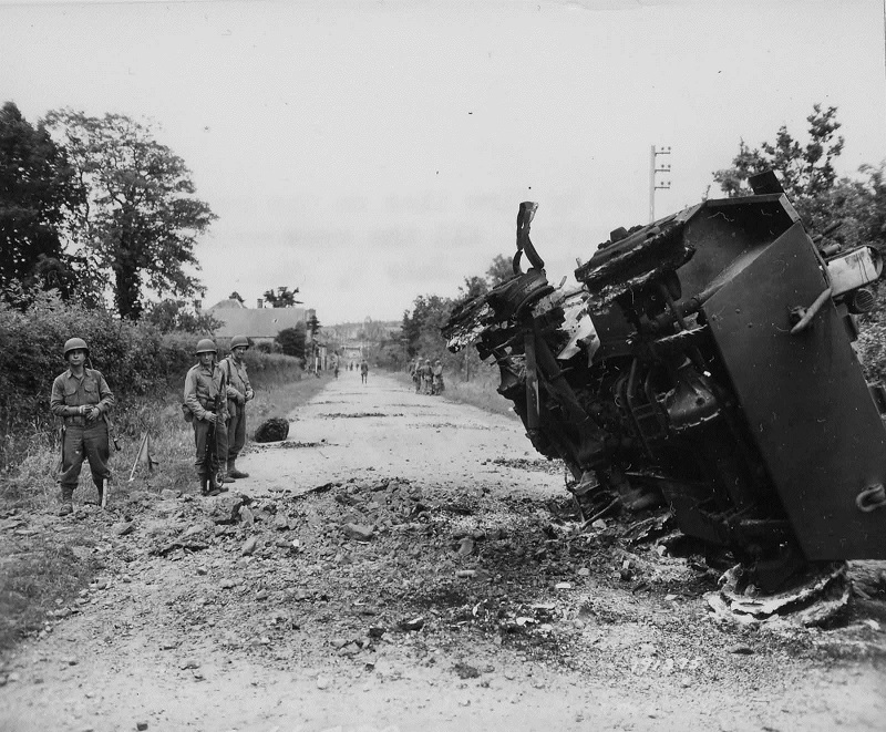 79th-infantry-division-m8-greyhound-destroyed-by-mine-la-haye-du-puits-france_imagesia-com_13f2e.jpg